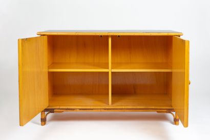 null AUDOUX-MINET, follower of. 
Small rectangular sideboard in bamboo, light wood,...