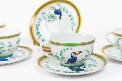 null HERMÈS, Paris.
Suite of four tea cups and five saucers, model "Toucan" in white...