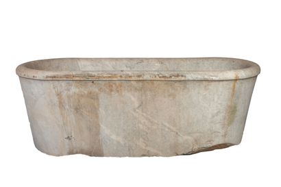 null Oval bathtub in carved white marble, decorated in relief with two rings on one...