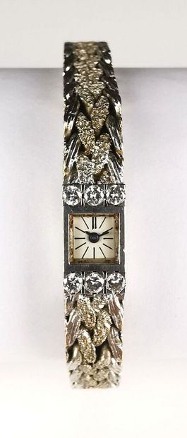 null VACHERON CONSTANTIN.
Ladies' wristwatch in white gold, partially gilded, the...