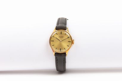 null VAN CLEEF & ARPELS.
Lady's watch with yellow gold case, the dial with champagne...