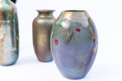 null Serafino FERRARO (1939-2017). 
Four ceramic vases with iridescent enamel. 
Signed,(except...