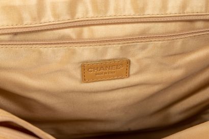 null CHANEL, Paris.
Handbag with double handle in beige lambskin, black stitching....