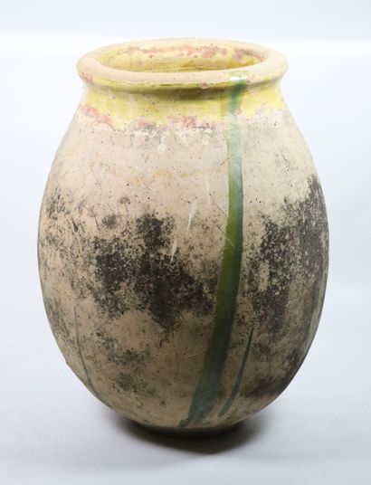 null BIOT.
Oil jar with yellow glazed neck, the body covered with some green enamel...