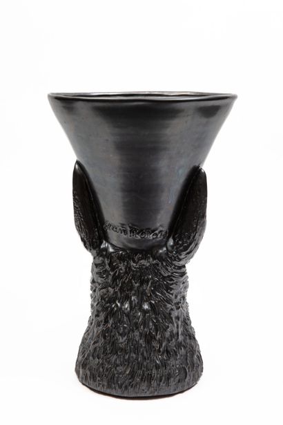null Jean MARAIS (1913-1998).
Important zoomorphic vase with llama, in black glazed...