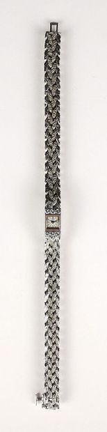 null VACHERON CONSTANTIN.
Ladies' wristwatch in white gold, partially gilded, the...