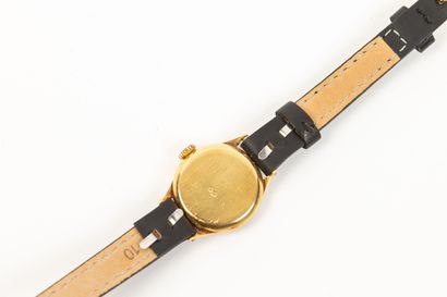 null VAN CLEEF & ARPELS.
Lady's watch with yellow gold case, the dial with champagne...