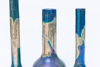 null Serafino FERRARO (1939-2017). 
Quatre vases en céramique à décor de coulures...