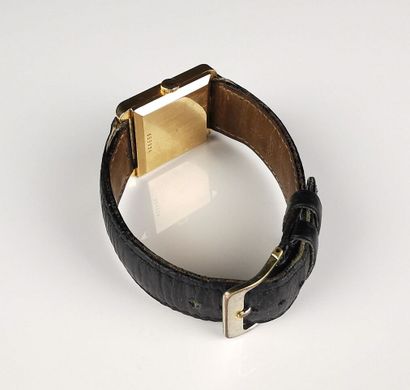 null JAEGER-LECOULTRE.
Yellow gold wristwatch, the square case with radiating decoration,...