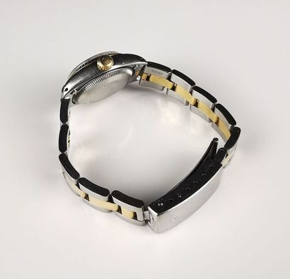 null ROLEX.
Montre bracelet de femme en or jaune et acier modèle « Oyster Perpetual...
