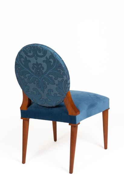 null Suite of ten chairs and two armchairs with medallion backs in stained wood and...