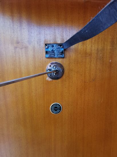 null Gentleman's Compactom Wardrobe with two mahogany and gilded brass veneer doors,...