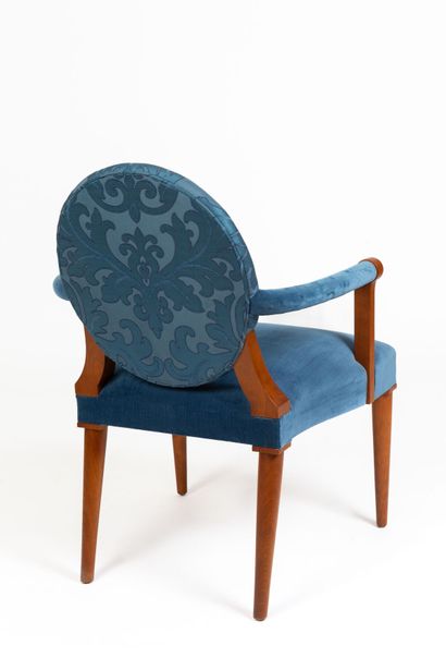 null Suite of ten chairs and two armchairs with medallion backs in stained wood and...