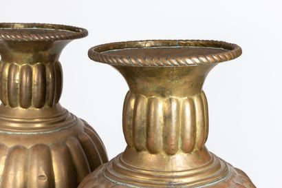 null Pair of large ornamental baluster vases in embossed copper alloy, decorated...