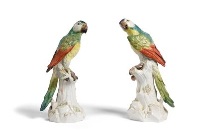 null MEISSEN. 
Pair of large polychrome porcelain parrots, perched on stumps.
Marks...