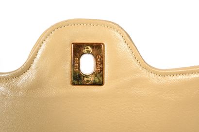 null CHANEL, Paris.
Timeless" bag in quilted beige lambskin leather, gold-tone metal...