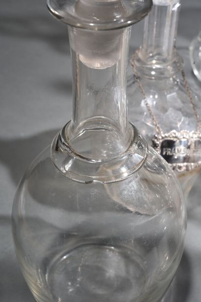 null Collection of twenty-one carafes in cut crystal, molded glass and engraved glass.
19th...