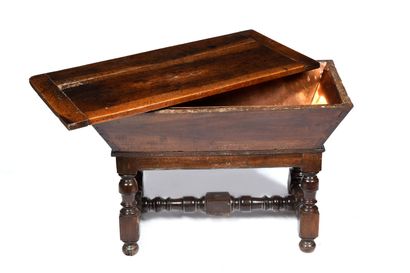 null Patinated walnut kneading trough with turned base. 
Complete with copper interior,...