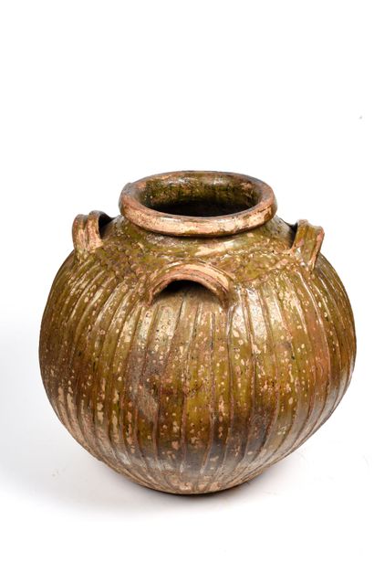 null Large "melard" earthenware jar with green-brown glaze.
The globular body features...