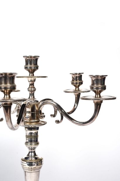 null Pair of six-light candelabra with transformation (can be used as candlesticks)...