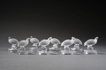 null LALIQUE France.
Suite of eight pressed and partially satin-finished molded crystal...
