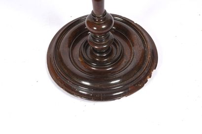 null Circular light stand in turned walnut with twisted shaft.
17th-century period,...
