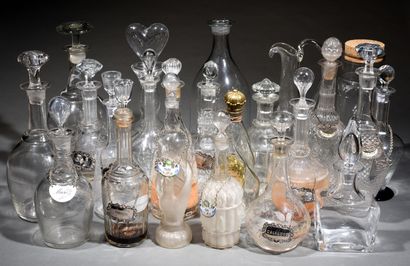 null Collection of twenty-one carafes in cut crystal, molded glass and engraved glass.
19th...
