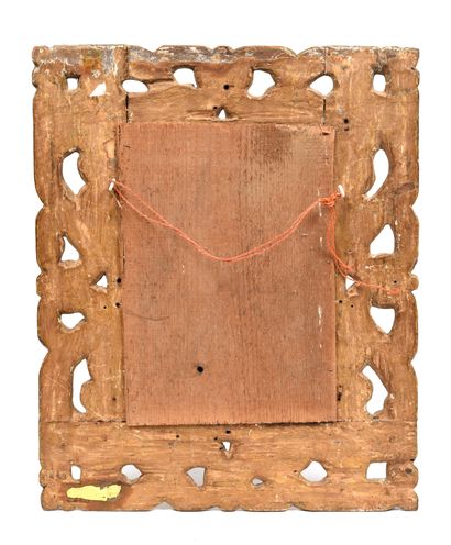 null Rectangular gilded wood mirror decorated with large openwork foliage. 
Italy,...