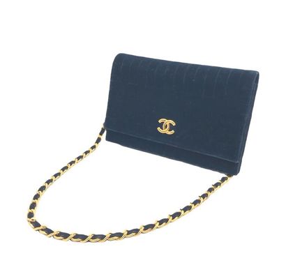 null CHANEL, Embossed navy blue velvet evening bag, gold metal chain and leather,...