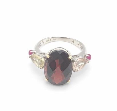 null *585 white gold ring, set with an oval briolette-cut garnet surrounded by semi-precious...