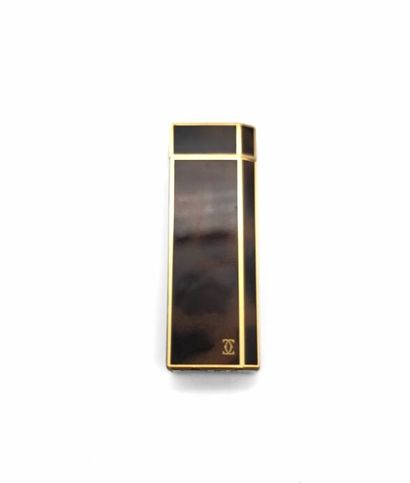 CARTIER, Lighter in gold plated metal with...