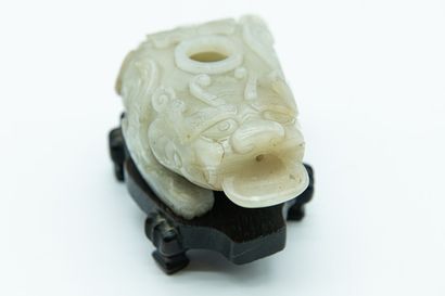 null CHINA - 17th century
Celadon jade (nephrite) dropper in the shape of a bixie,...