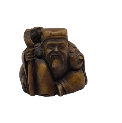 null JAPAN - 20th century
Eight small okimono in the netsuke style, three in wood...