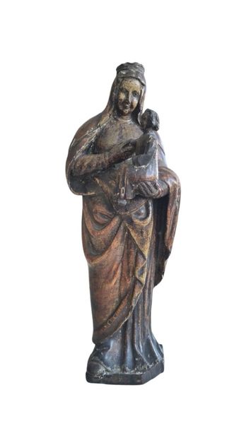Carved, polychrome and gilded Virgin and...