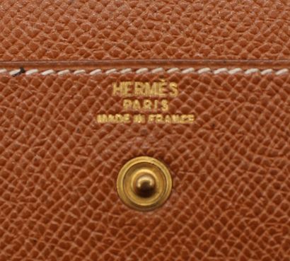null HERMES, Brown grained leather purse or card holder, closes with a snap fastener,...