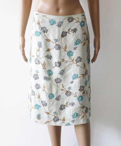 null Set of four skirts and one pair of pants, including one pair of beige wool pants,...