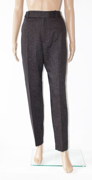 null Two pairs of wool pants, one in grey and the other in black, grey and red
Size...