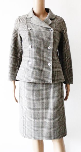 null Reversible wool jacket and skirt suit, one side mottled gray, the other houndstooth...