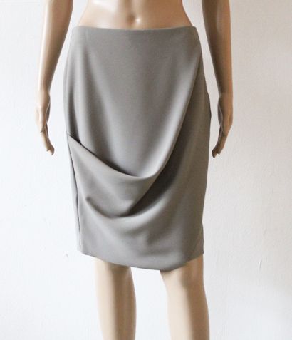 null Emporio ARMANI, Set of two skirts in beige and grey, one in wool, stains and...