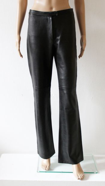 null Set of two pairs of pants, one in smooth black leather and the other in brown...