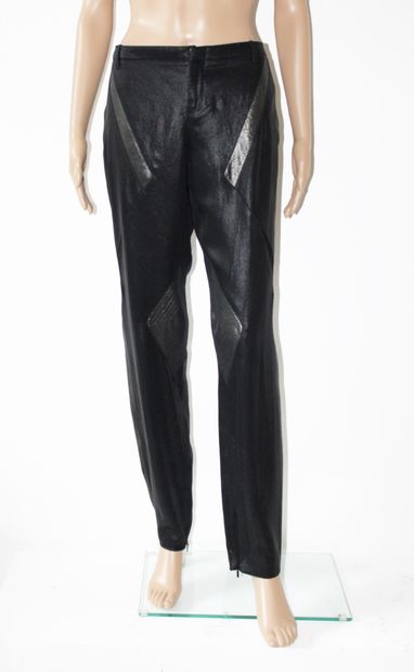 null GUCCI, Black lamé slim-fit pants with geometric inserts, new with label
Size...