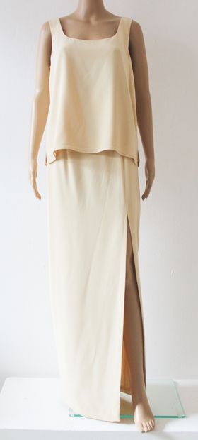 null BLACKTIE, eggshell-colored suit consisting of a long cutaway skirt, top and...