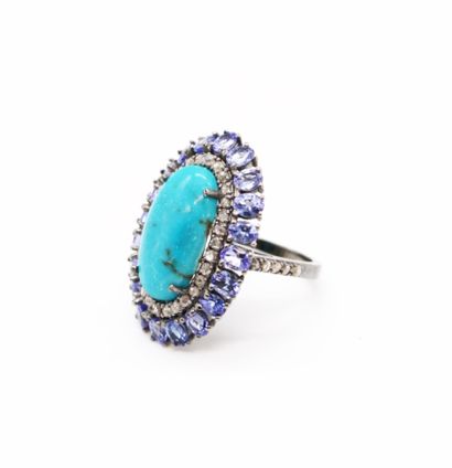 null Ring in 925 blackened silver, set with a turquoise cabochon in a diamond and...