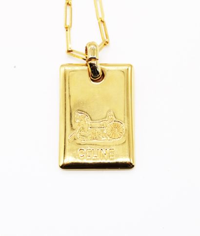 null CELINE, Gilded metal pendant with chain, missing gilding, in its case
pendant...