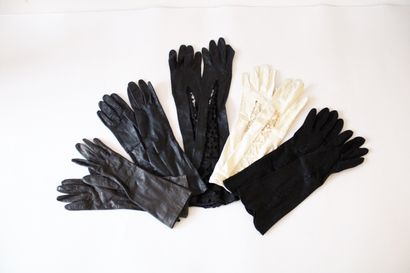 null Set of ten pairs of leather gloves.
two pairs of long leather and lace gloves,...