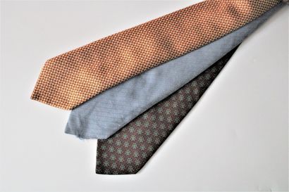 null HERMES, Three silk ties with geometric designs, in orange, blue and green t...