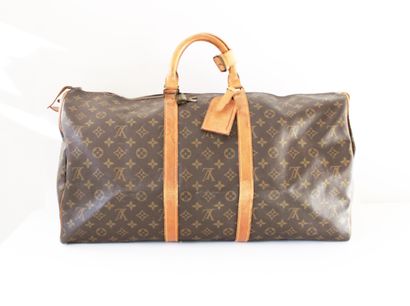 null Louis VUITTON, Keepall model travel bag in leather and canvas monogrammed LV,...