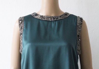 null GAUDI, Dress probably sleeveless, in bottle green silk, collar and sides embroidered...