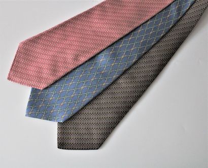 null HERMES, Three geometrically decorated silk ties in pink, grey and blue.