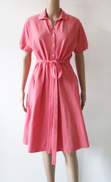 null LACOSTE, Pink cotton polo dress with belt. Two striped dresses in wool and linen.
Estimated...